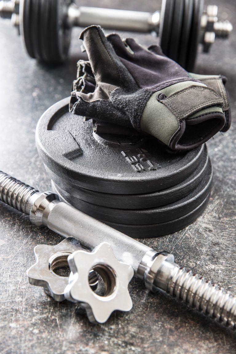 dumbbell and fitness gloves 5A3SYQD 768x1152