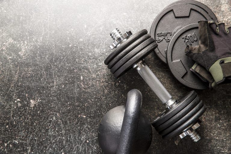 dumbbell and fitness gloves E9WR27H 1 768x512