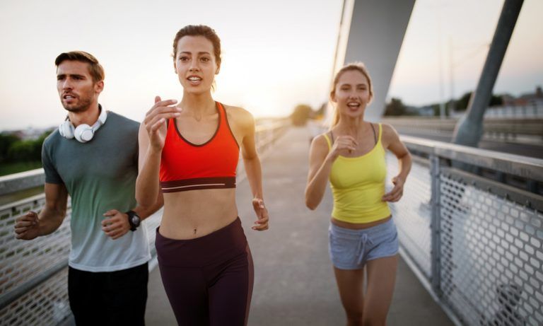 fitness sport people and running concept happy HB2UYQF 768x461