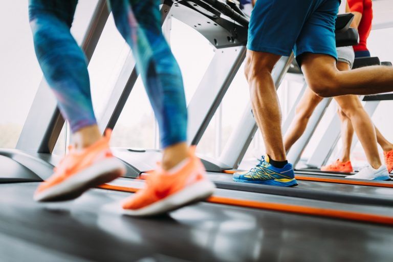 healthy man and woman running on a treadmill in a GS6VAND 1 768x512