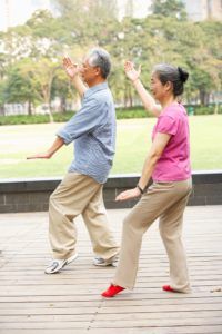 senior chinese couple doing tai chi in park PLAADNQ 200x300