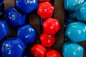 stand with colorful dumbbells in modern gym FMW82RJ 1 300x200