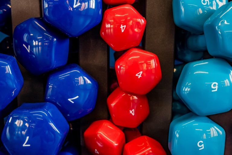 stand with colorful dumbbells in modern gym FMW82RJ 1 768x513