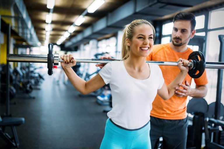 working out in fitness center QKWH74A 3 768x512