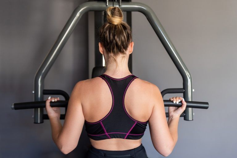 young athletic woman exercising at the gym KSFQWT6 11 768x513