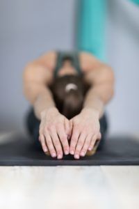 woman doing yoga exercises in gym sport fitness P62EU7E 200x300